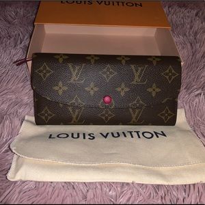 Louis Vuitton Emilie wallet in fuchsia